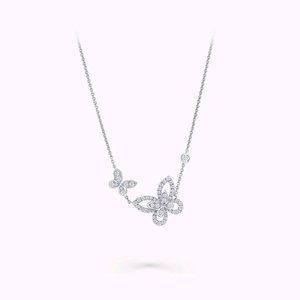 Double butterfly diamond pendant